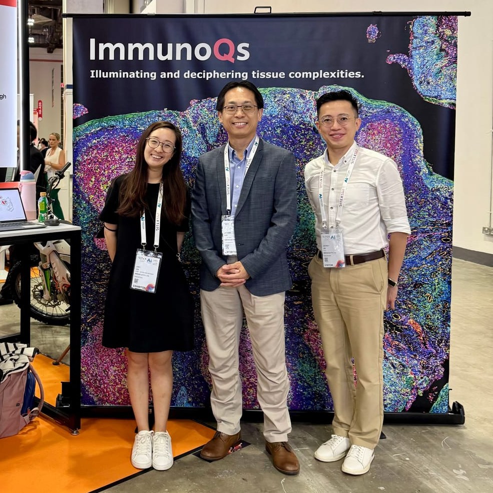 The three founders at the ImmunoQs booth at GITEX Asia 2025